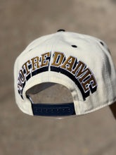 Load image into Gallery viewer, 9Fifty A-Frame Snapback Notre Dame "Fighting Irish" Chrome/Navy - Green UV

